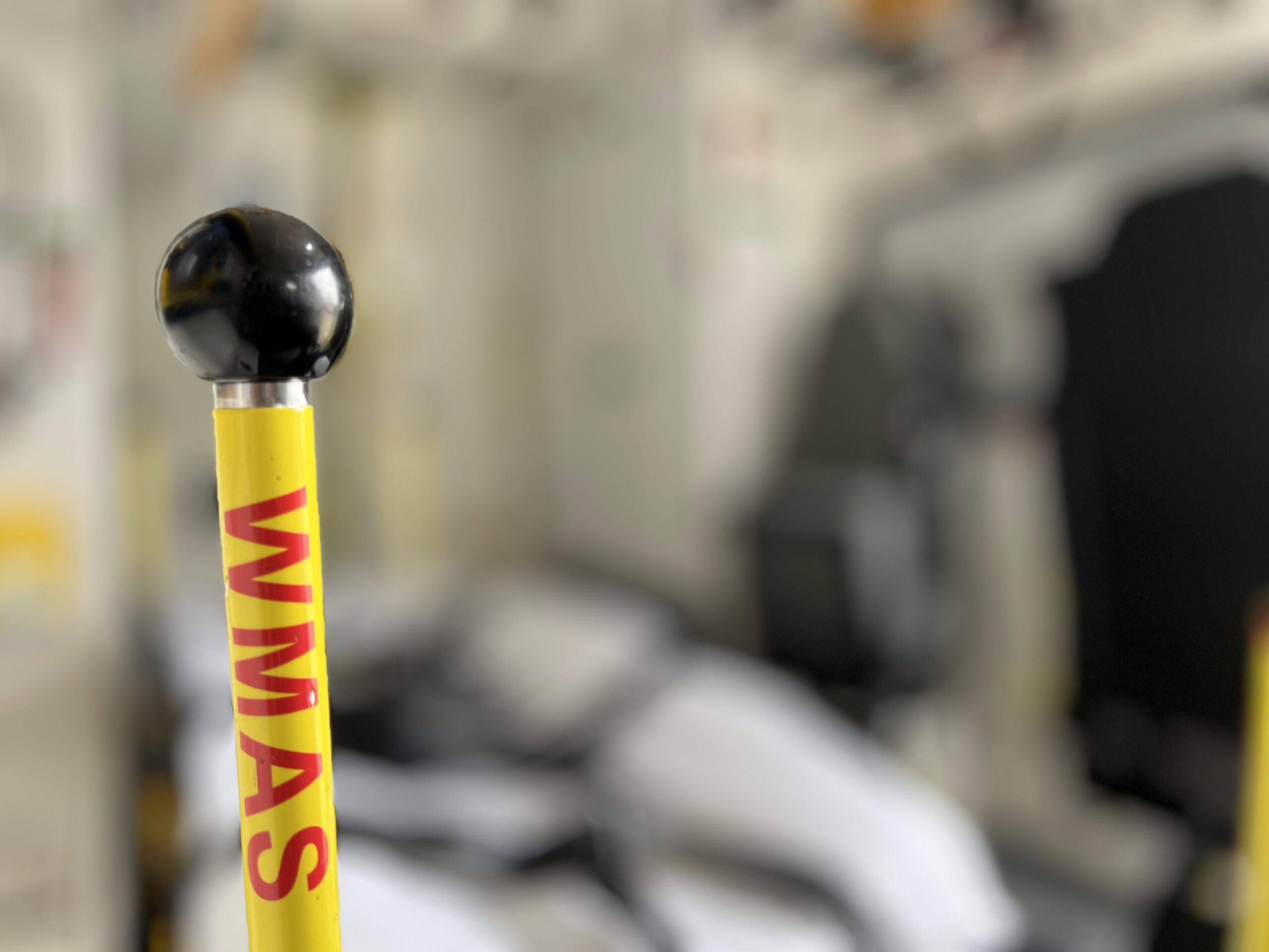 Woman seriously injured in Sandwell RTC - Focus on stretcher handle in back of ambulance with background blurred.