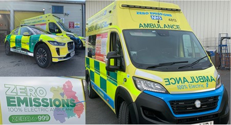 A collection of ambulance vehicles and a close up of a sign promoting zero emissions on an electric ambulance. 