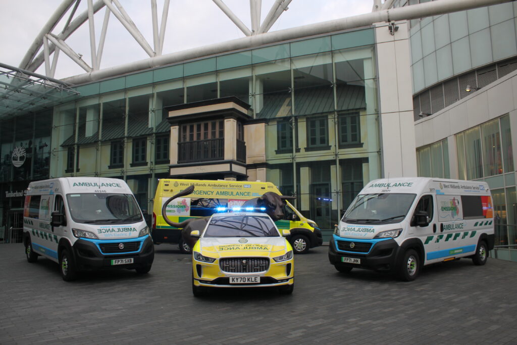 A collection of electric ambulance vehicles outside the Bullring in Birmingham