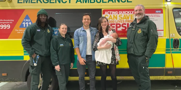 Paramedics with new parents Phoebe and Antony and baby Lenny