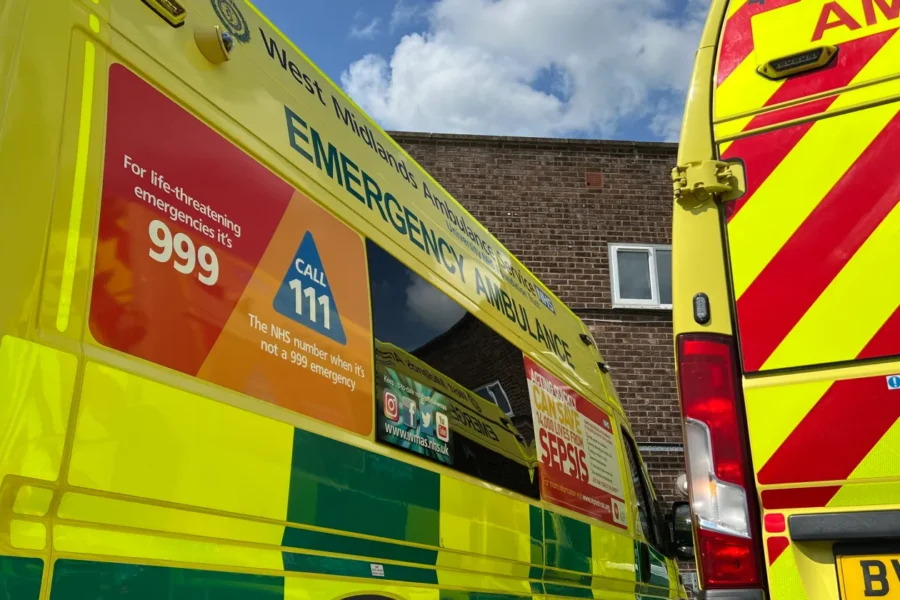 two ambulances outside a building