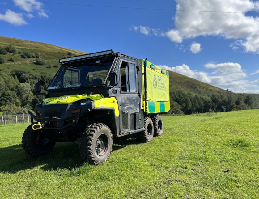 A Hazardous Area Response Team polaris vehicle parked in field during sunny weather