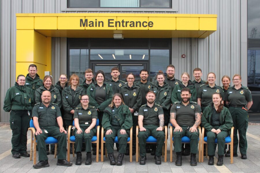 A group of student paramedics who have successfully completed a degree course